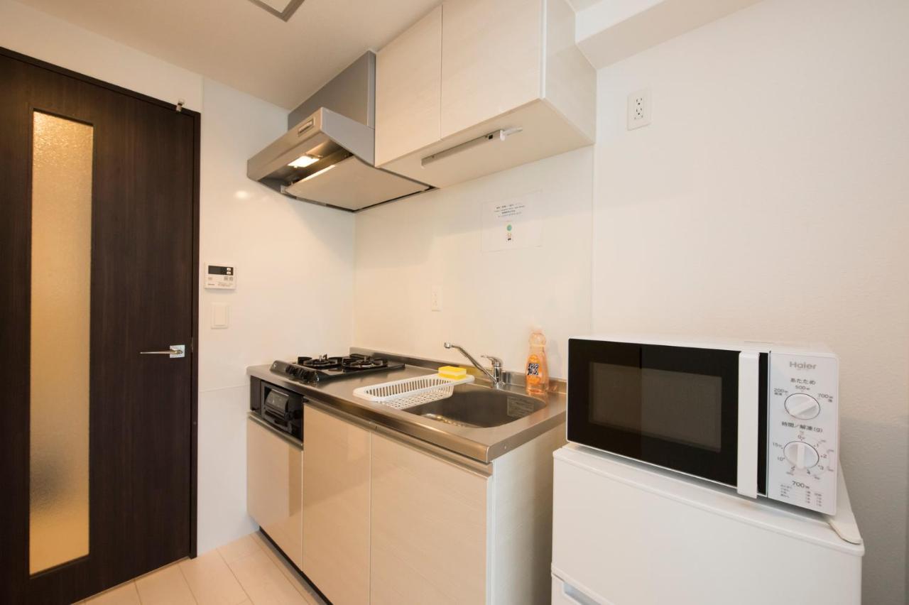 Kamon Apartment Осака Экстерьер фото